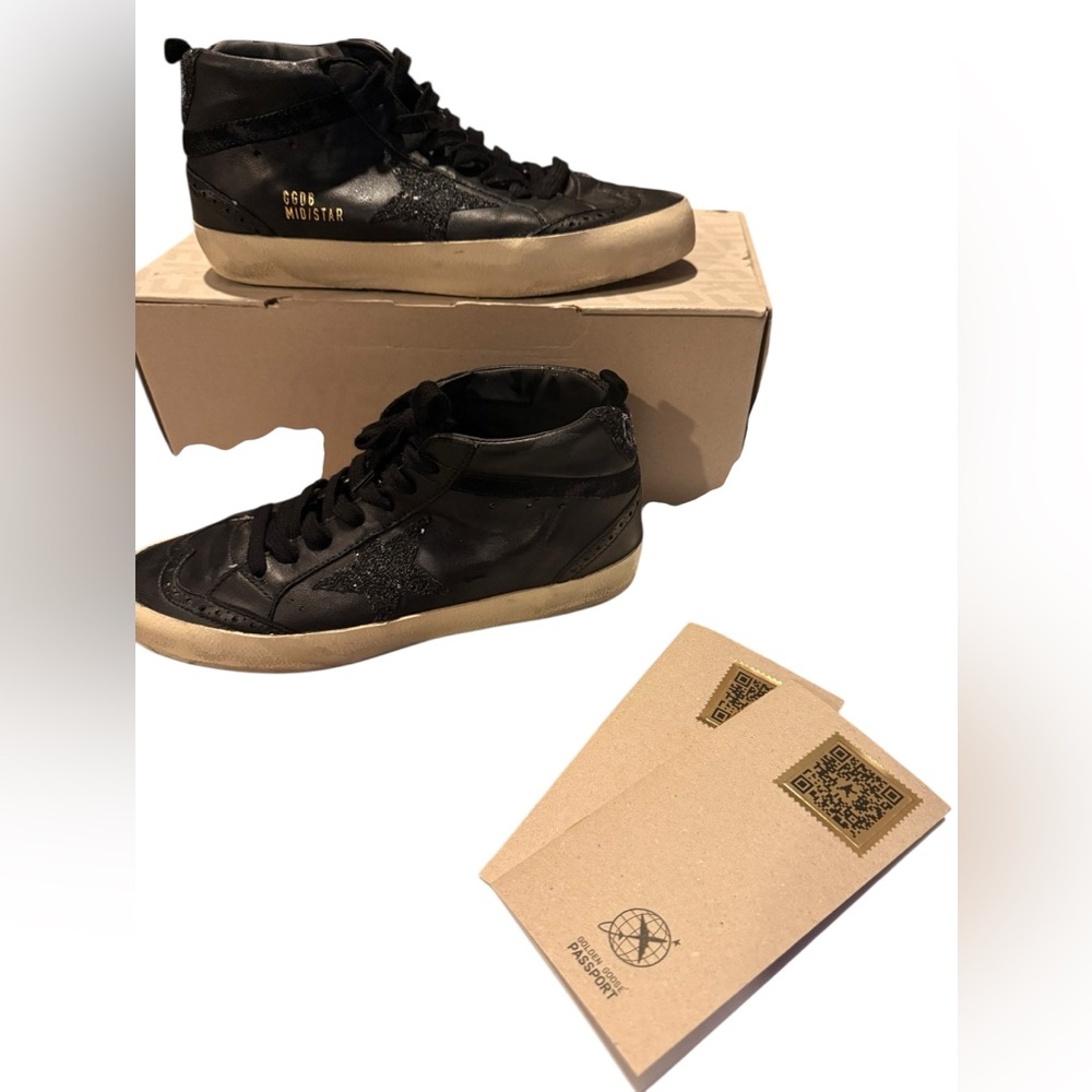 NWT In Box.  Unworn. Golden Goose Black and Cream Mid Star Sneakers